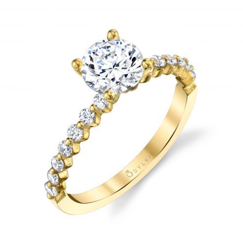 SOLITAIRE ENGAGEMENT RING WITH SIDESTONES