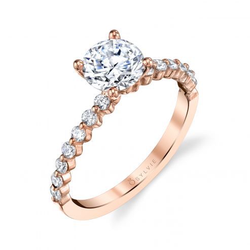 SOLITAIRE ENGAGEMENT RING WITH SIDESTONES